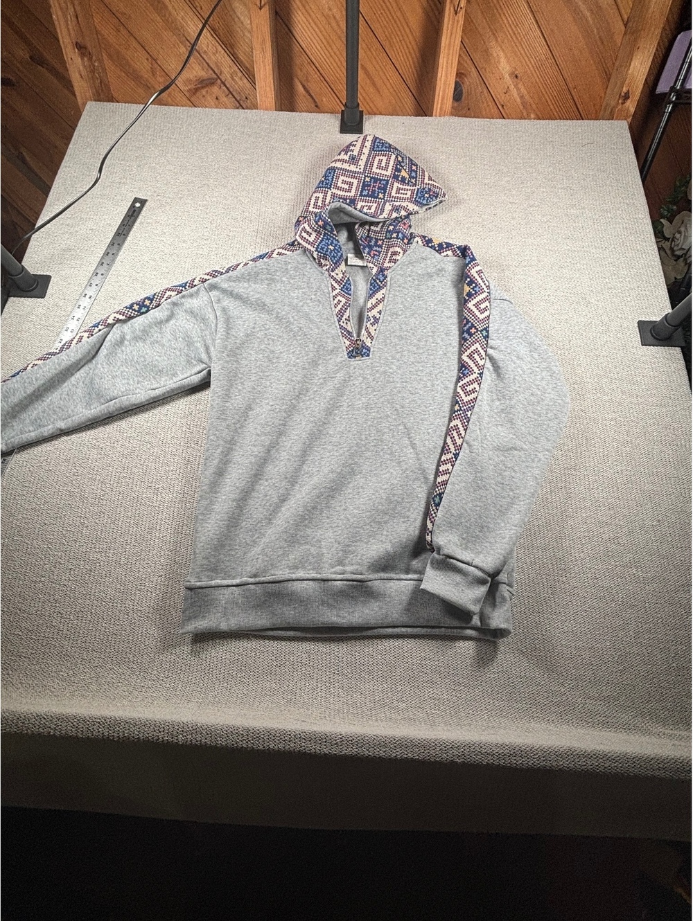 Gray Pullover Hoodie with Patterned Hood and Zip Detail